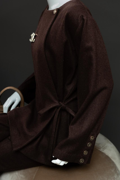 Woolen side tie up blazer with a very comfortable ,perfect for a day wear or a night out paired with small slit pants.